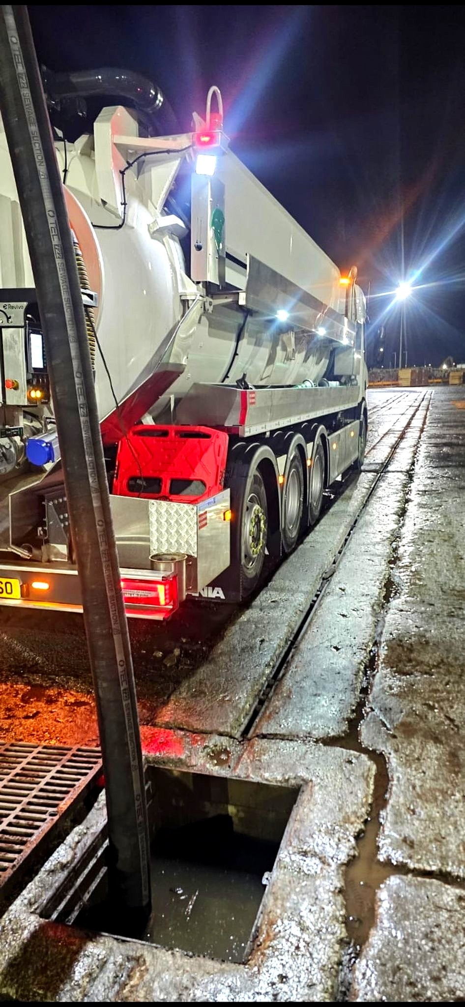 AMC drainage tanker working at night