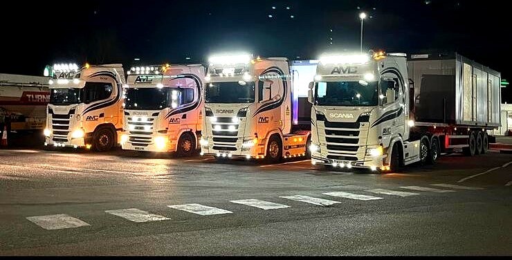 AMC fleet lit up at night