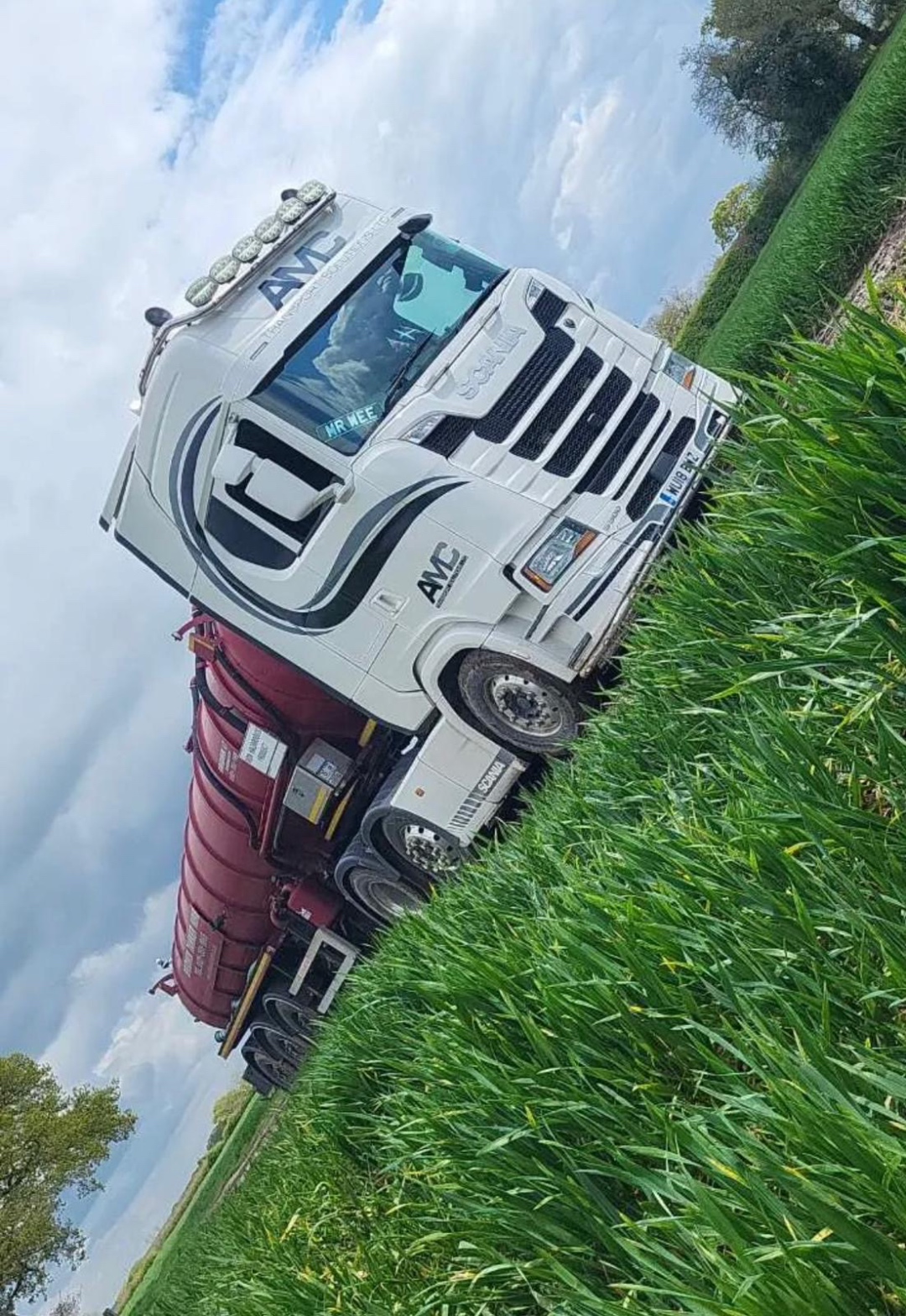 AMC tractor bowsers in field